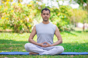 Man meditating - yoga day - corporate mats