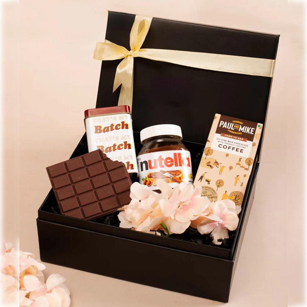 Elegant Delights Women's Day Chocolate Feast – A delightful assortment of chocolates perfect for celebrating Women's Day.