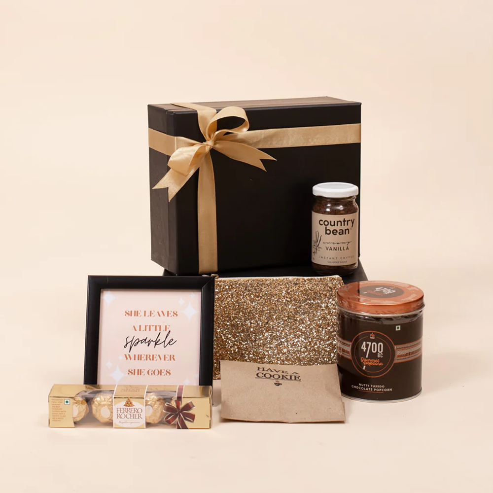 Elegant Golden Truffle Empowerment Box, ideal Women's Day Corporate Gift, showcasing curated treats for a meaningful and empowering celebration.