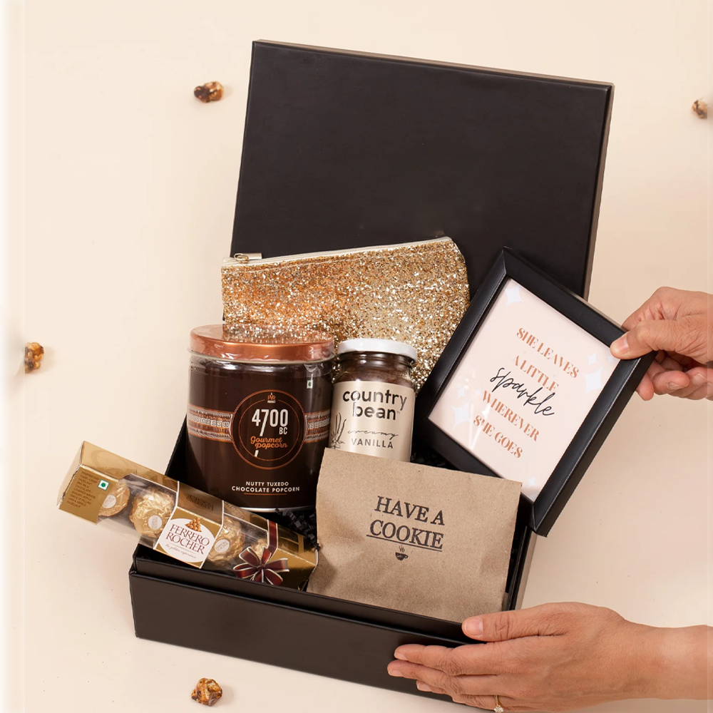 Elegant Golden Truffle Empowerment Box, ideal Women's Day Corporate Gift, showcasing curated treats for a meaningful and empowering celebration.