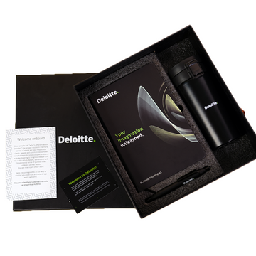 Employee Entry Pack featuring an organizational dairy, professional pen, and stylish coffee mug.